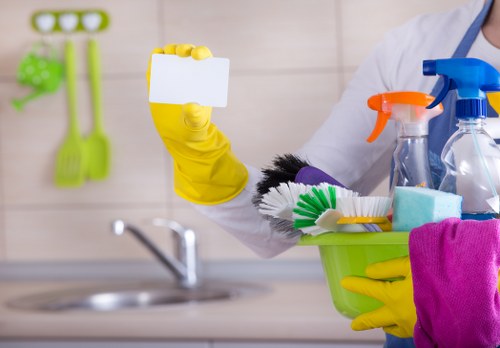 Technician preparing carpet cleaning equipment in a safe home environment