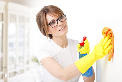 Operative checking the work area for hazards before carpet cleaning